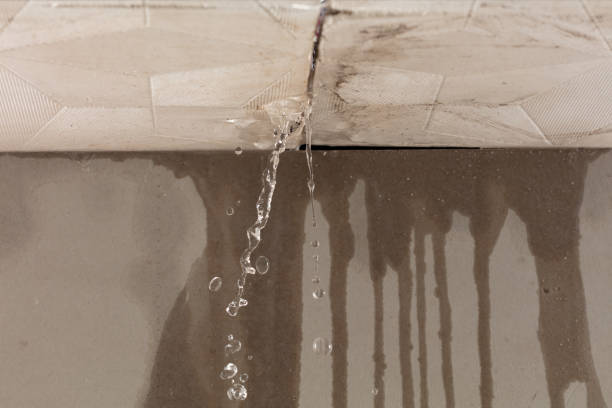 Professional Flood Damage Cleanup technician working in Warwick, MA